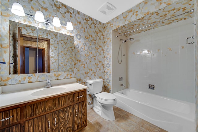 bathroom featuring shower / tub combination, toilet, vanity, visible vents, and wallpapered walls