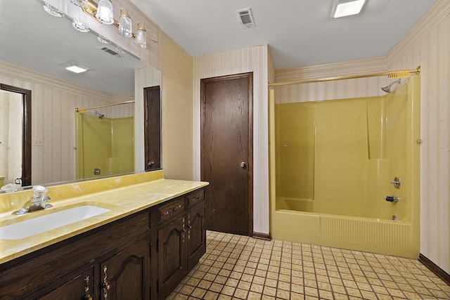 bathroom featuring  shower combination, visible vents, and vanity