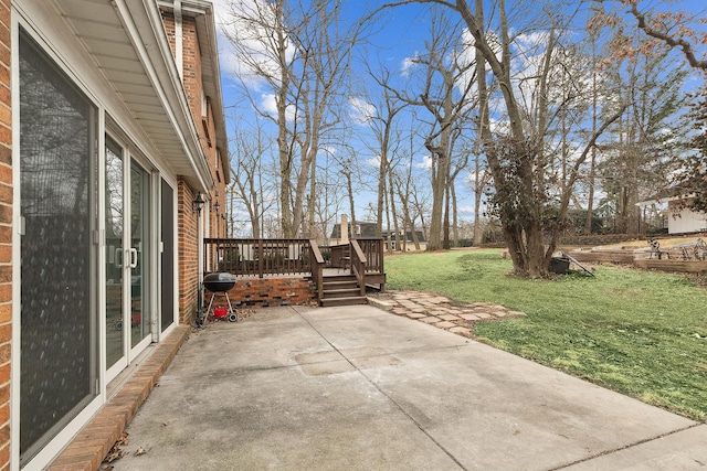 view of patio / terrace featuring area for grilling and a wooden deck