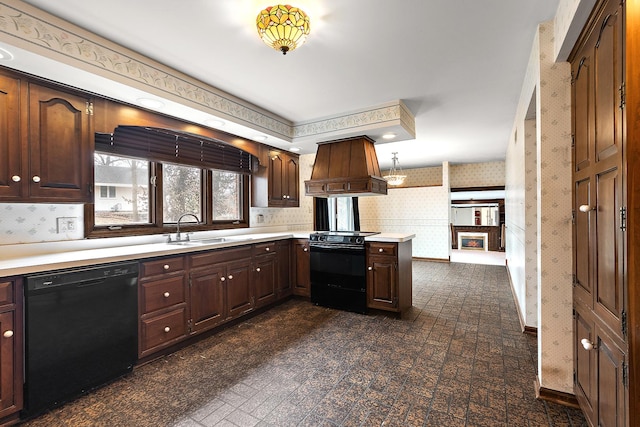 kitchen with black appliances, custom exhaust hood, light countertops, and wallpapered walls