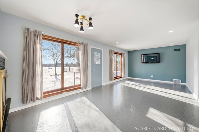 interior space featuring recessed lighting, visible vents, and baseboards