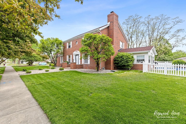 330 Fox Trl, Bourbonnais, IL 60914 - view of home's exterior with brick siding and a chimney