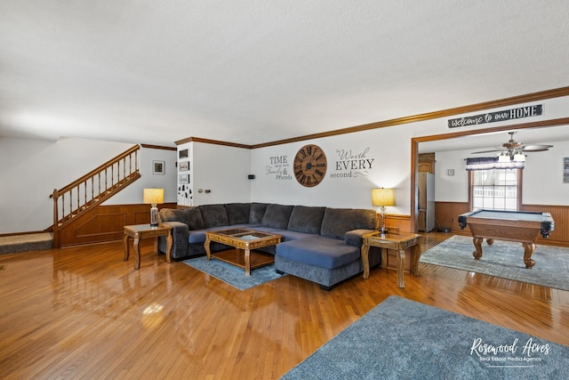 330 Fox Trl, Bourbonnais, IL 60914 - living area featuring wood finished floors, wainscoting, billiards table, stairway, and ornamental molding