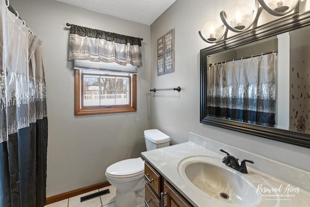 330 Fox Trl, Bourbonnais, IL 60914 - full bathroom with toilet, vanity, tile patterned floors, and baseboards