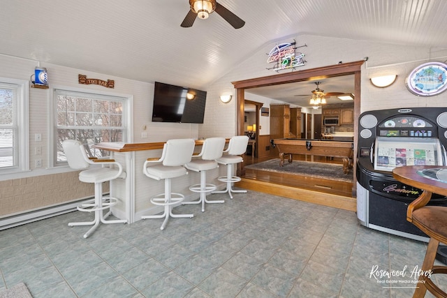 330 Fox Trl, Bourbonnais, IL 60914 - indoor dry bar with a ceiling fan, vaulted ceiling, stainless steel microwave, pool table, and plenty of natural light