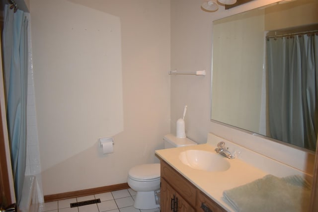 10600 Lynn Dr, Orland Park, IL 60467 - full bath with toilet, tile patterned flooring, baseboards, and vanity