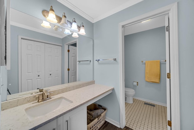 bathroom featuring crown molding, visible vents, toilet, vanity, and baseboards