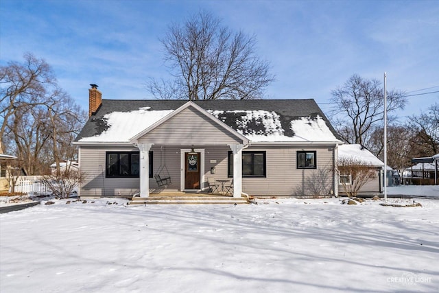 view of front of house with a chimney