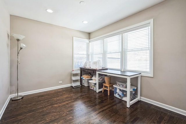 office space with recessed lighting, dark wood-style flooring, and baseboards