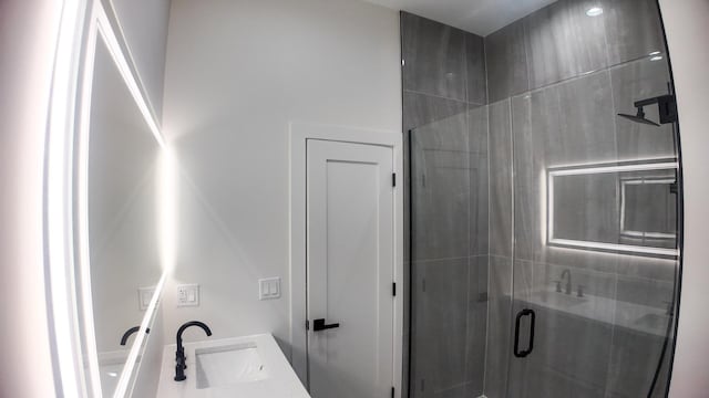 full bath featuring a shower stall and vanity