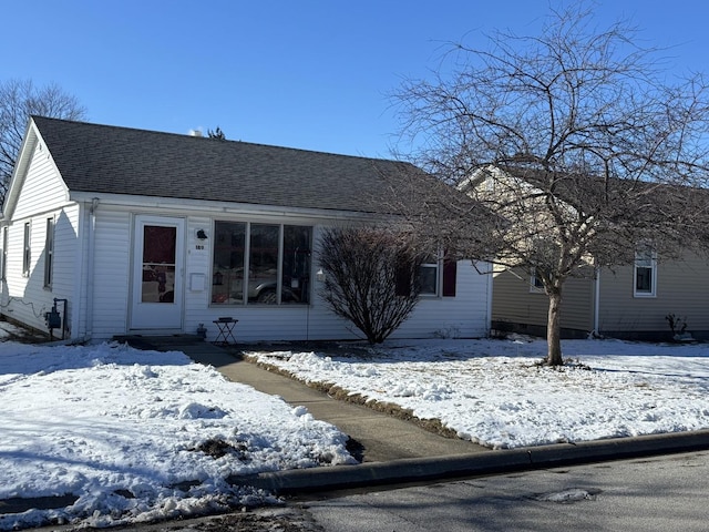 view of front of house with a shingled roof