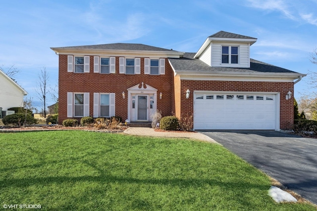 view of front of property featuring aphalt driveway, brick siding, an attached garage, and a front lawn