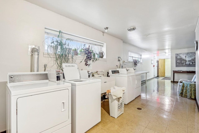 shared laundry area featuring washer and dryer