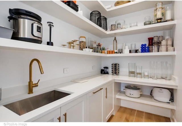 storage area featuring a sink