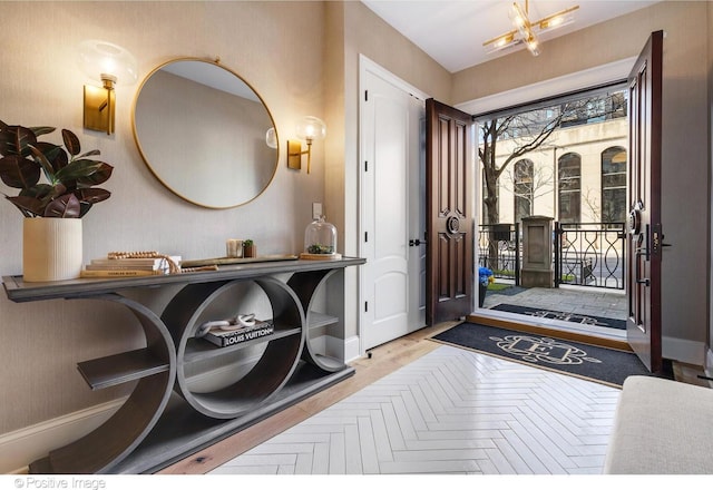 entryway featuring baseboards