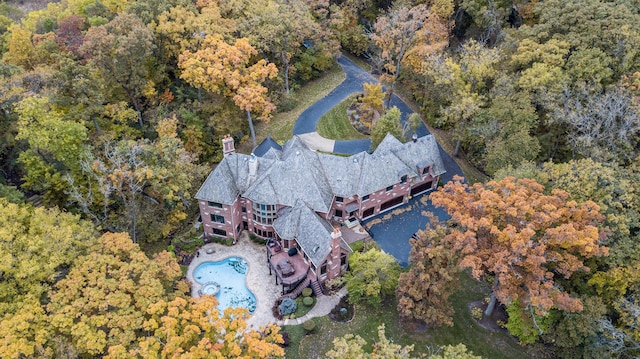 bird's eye view with a forest view