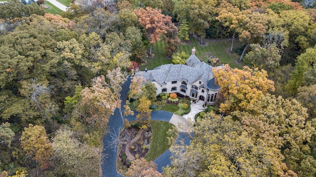 aerial view featuring a view of trees