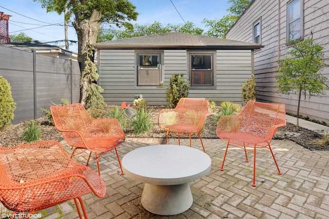 view of patio / terrace featuring fence