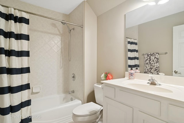 full bathroom with shower / tub combo, vanity, and toilet