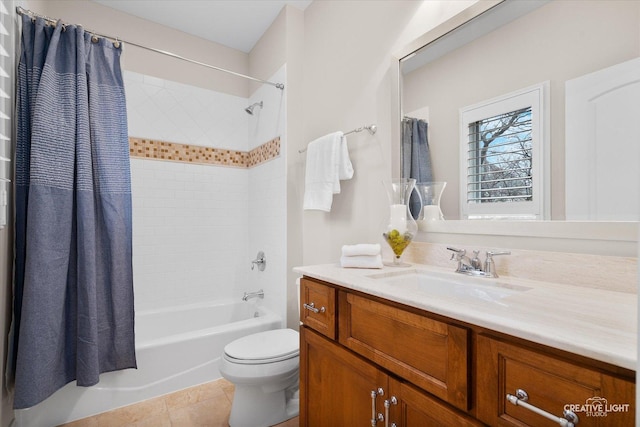 bathroom with tile patterned floors, toilet, shower / bath combo, and vanity