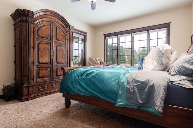 bedroom with access to exterior, carpet, multiple windows, and ceiling fan