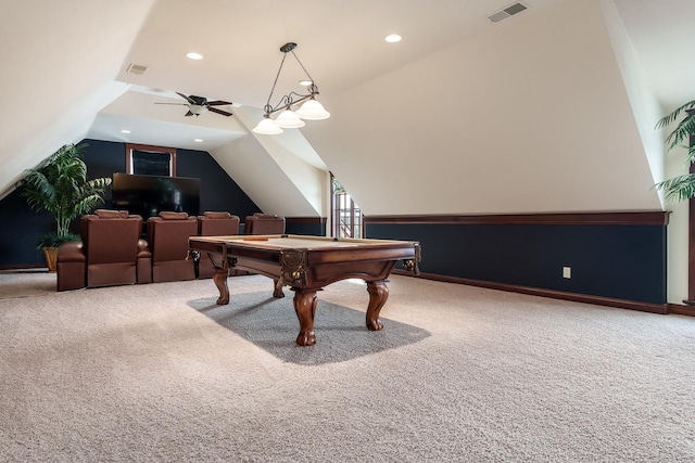 rec room featuring lofted ceiling, ceiling fan, visible vents, and carpet flooring