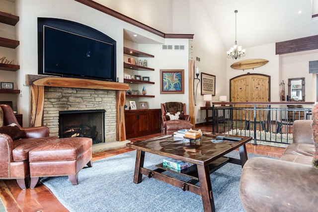 living area featuring a chandelier, high vaulted ceiling, a stone fireplace, wood finished floors, and visible vents