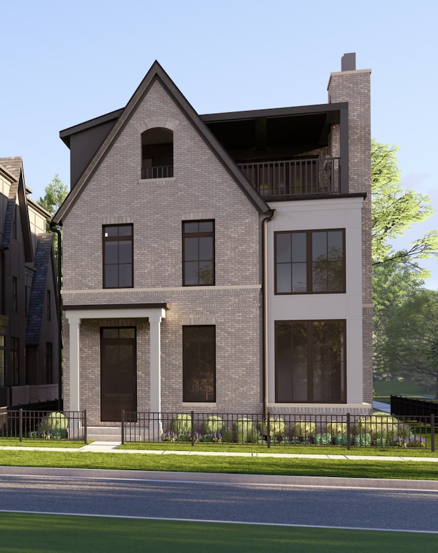103 S Webster St, Naperville, IL 60540 - view of front of property with a fenced front yard, a balcony, and brick siding