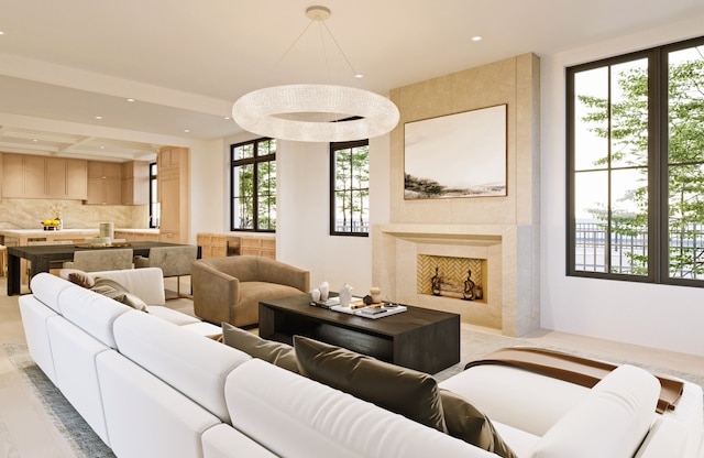 living room featuring recessed lighting and a high end fireplace