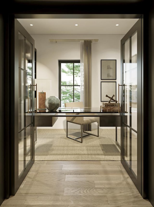 office space featuring french doors, recessed lighting, and light wood-style floors