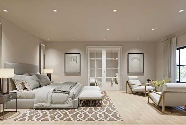 bedroom with recessed lighting and wood finished floors