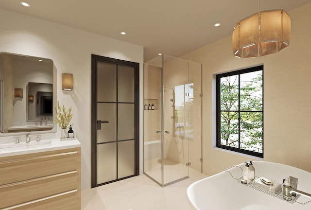 full bath featuring a stall shower, recessed lighting, a freestanding tub, and vanity