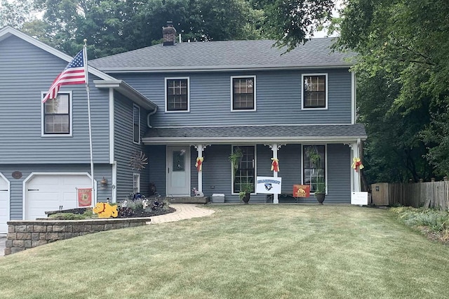 view of front of property with covered porch, roof with shingles, fence, and a front lawn