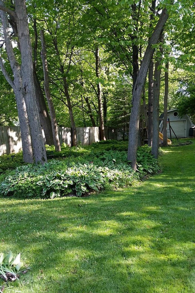 view of yard featuring fence