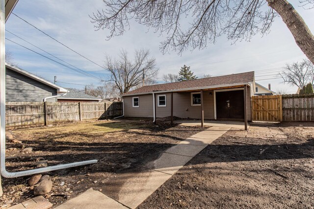 1503 Ottawa Ave, Ottawa, IL 61350 - back of house with a fenced backyard and roof with shingles