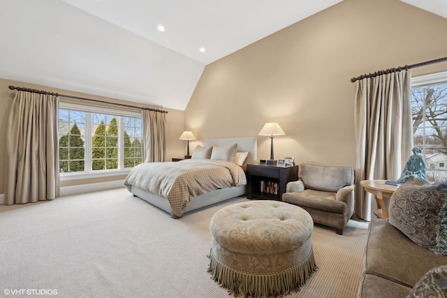 bedroom with light carpet, multiple windows, and recessed lighting