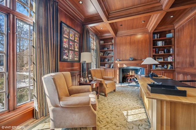 home office with built in shelves, ornamental molding, wooden walls, wooden ceiling, and coffered ceiling