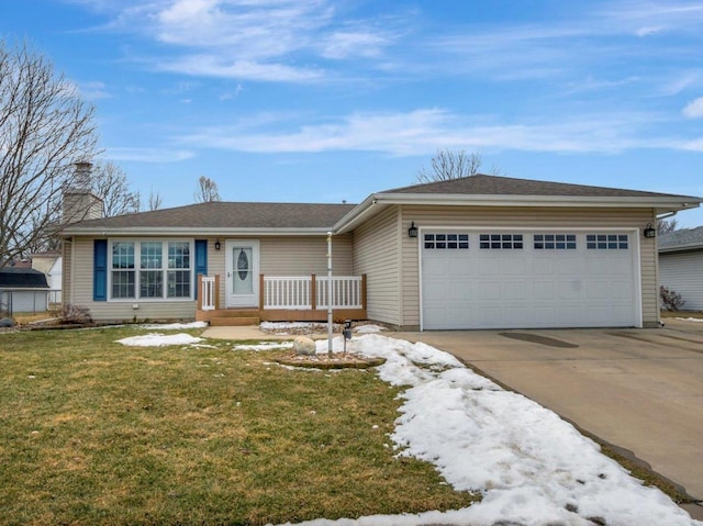 ranch-style house featuring an attached garage, driveway, a chimney, and a front yard