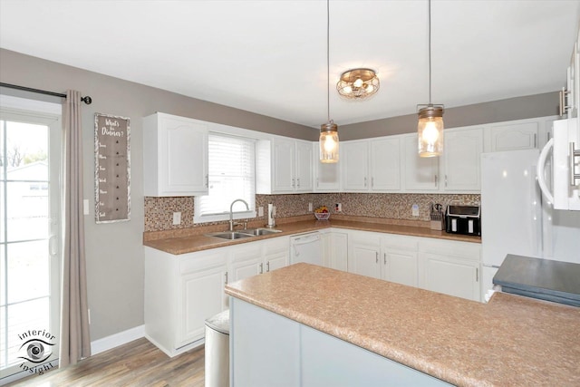 kitchen featuring white cabinetry