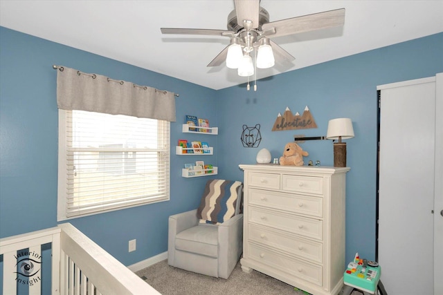 bedroom with baseboards, a ceiling fan, and light colored carpet