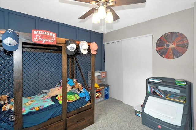 bedroom with light carpet and ceiling fan