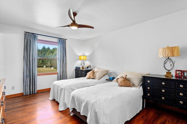 4461 N Il State Route 23, Leland, IL 60531 - bedroom featuring visible vents, a ceiling fan, baseboards, and wood finished floors