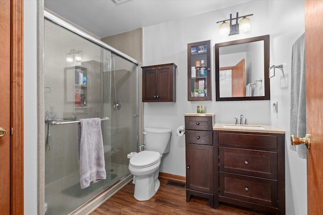 4461 N Il State Route 23, Leland, IL 60531 - bathroom with visible vents, a shower stall, toilet, and wood finished floors