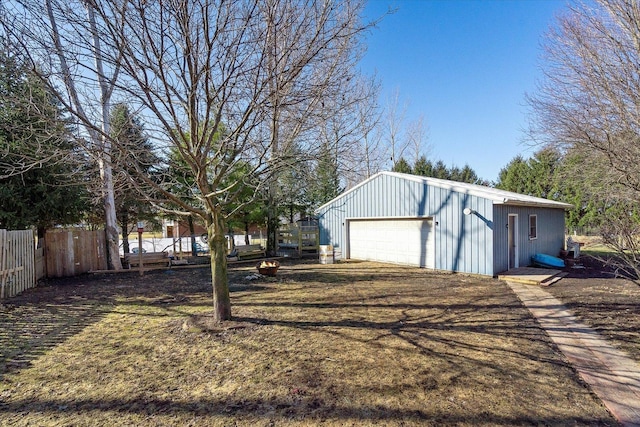 4461 N Il State Route 23, Leland, IL 60531 - view of yard with a detached garage, an outbuilding, and fence