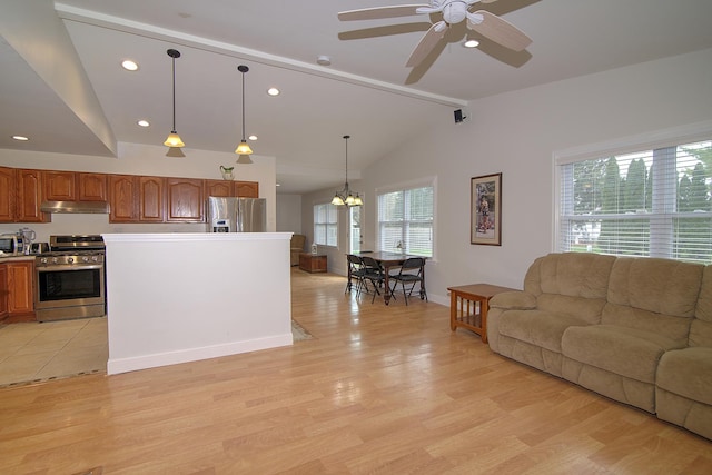 interior space featuring light wood finished floors, recessed lighting, baseboards, lofted ceiling with beams, and ceiling fan with notable chandelier