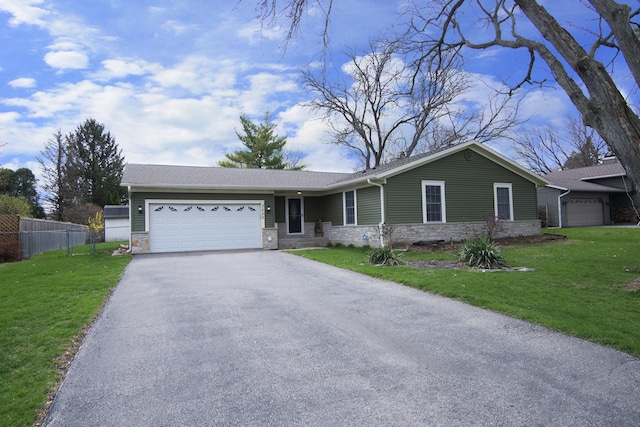 single story home featuring a garage, stone siding, a front lawn, and fence