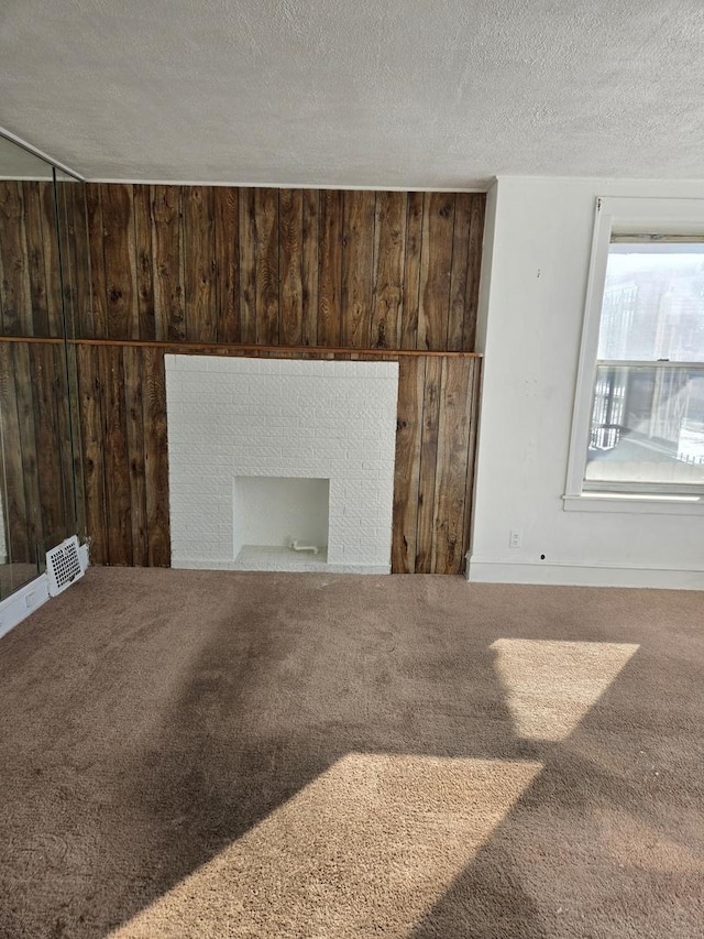 interior details with wood walls and carpet