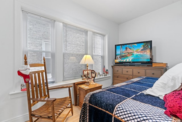 bedroom with light wood-style flooring