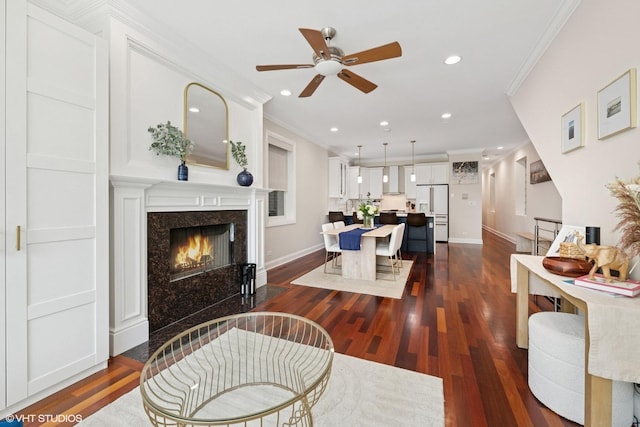 1418 W Chestnut St Unit 1, Chicago, IL 60642 - living room with ceiling fan, dark wood-style floors, recessed lighting, crown molding, and a fireplace