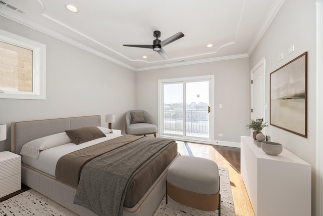 bedroom featuring light wood finished floors, visible vents, ornamental molding, access to outside, and recessed lighting